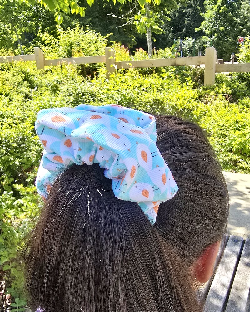 Pastel bunny-print scrunchie worn in long hair